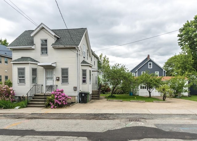 57 Prospect St, Watertown, MA 02472 - view of front facade with roof with shingles