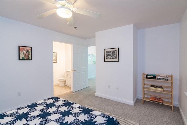 48 Northern Ave Unit 48, Northampton, MA 01060 - bedroom with light carpet, baseboards, ceiling fan, and ensuite bathroom