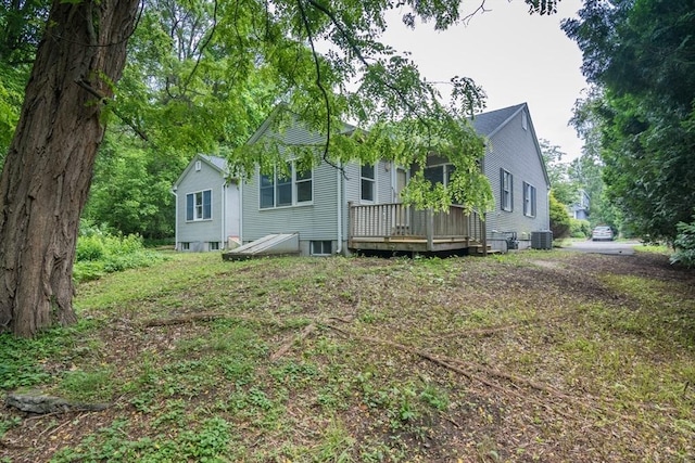 48 Northern Ave Unit 48, Northampton, MA 01060 - view of front facade with cooling unit and a wooden deck