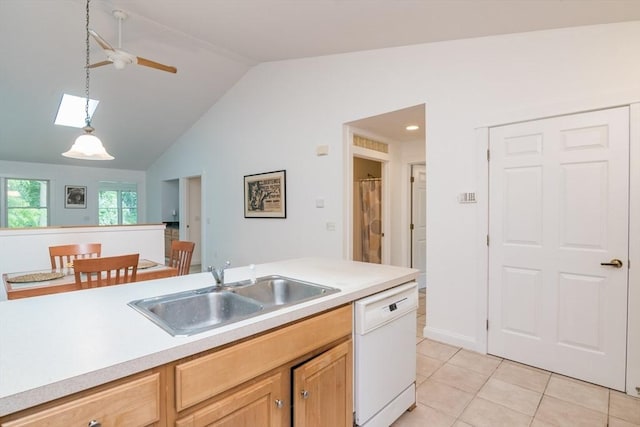 48 Northern Ave Unit 48, Northampton, MA 01060 - kitchen featuring white dishwasher, a sink, vaulted ceiling, a ceiling fan, and light countertops