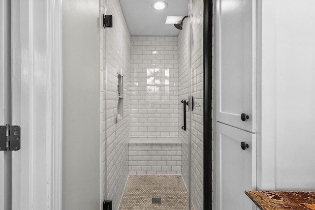 full bath with a stall shower and recessed lighting
