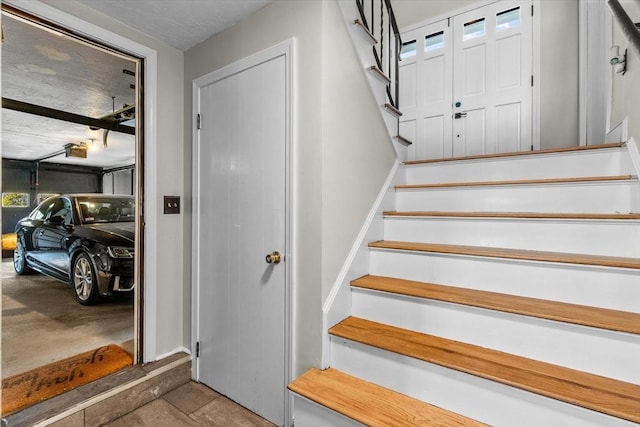 staircase with baseboards