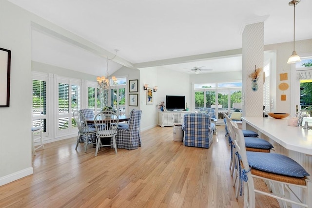 8 Barn Ln, Gloucester, MA 01930 - dining area with light wood-style flooring, a chandelier, and a ceiling fan