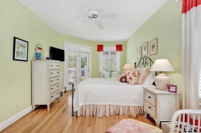 8 Barn Ln, Gloucester, MA 01930 - bedroom with access to outside, light wood-style flooring, and a ceiling fan
