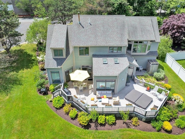8 Barn Ln, Gloucester, MA 01930 - back of house featuring a wooden deck, an outdoor hangout area, a fenced backyard, and a shingled roof
