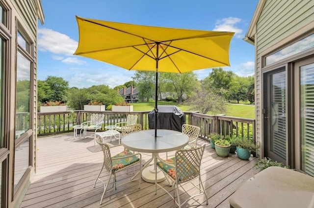 8 Barn Ln, Gloucester, MA 01930 - wooden terrace with area for grilling and outdoor dining space