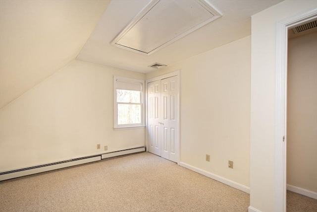 bonus room with attic access, visible vents, baseboards, carpet floors, and a baseboard heating unit