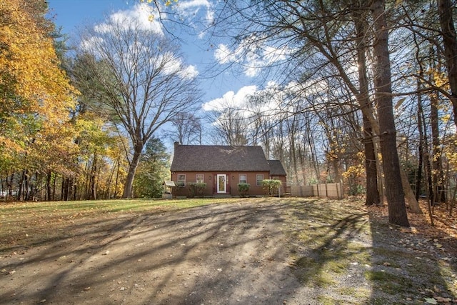 view of front of house with fence