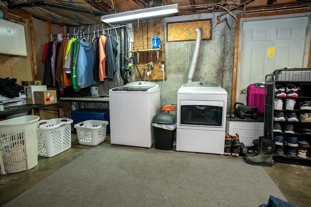 laundry area featuring washer and clothes dryer and laundry area