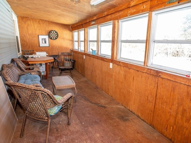 sunroom featuring wooden ceiling