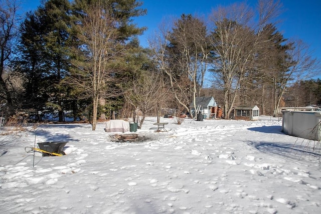 view of yard covered in snow