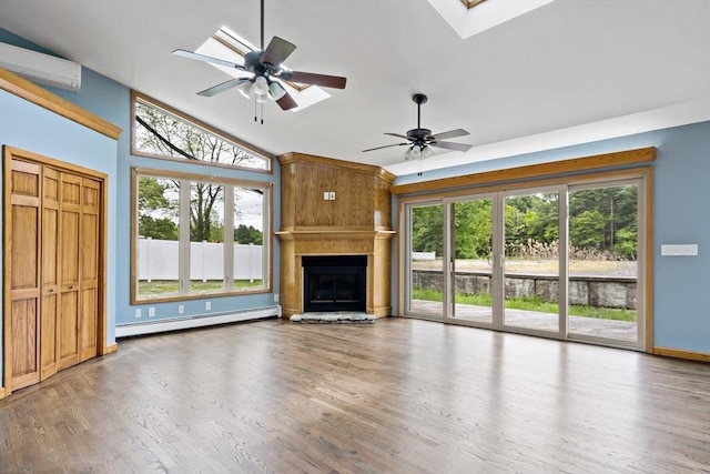 43 Water St, Freetown, MA 02702 - unfurnished living room featuring baseboard heating, a wall unit AC, lofted ceiling, and plenty of natural light