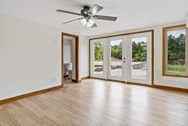 43 Water St, Freetown, MA 02702 - unfurnished room featuring light wood-style floors, baseboards, and a ceiling fan