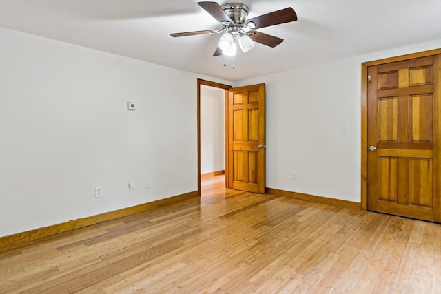43 Water St, Freetown, MA 02702 - unfurnished room featuring baseboards, light wood finished floors, and ceiling fan