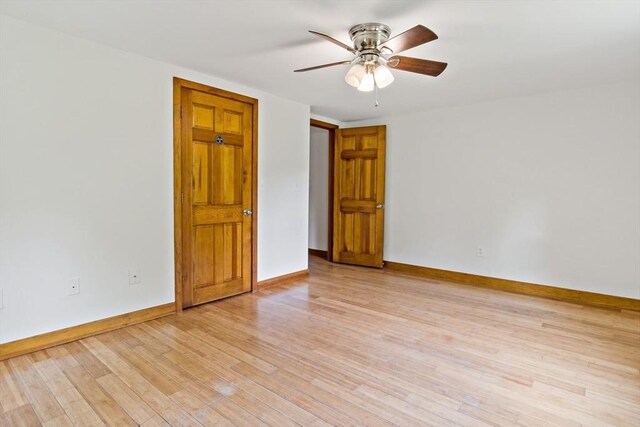 43 Water St, Freetown, MA 02702 - empty room featuring light wood finished floors, ceiling fan, and baseboards
