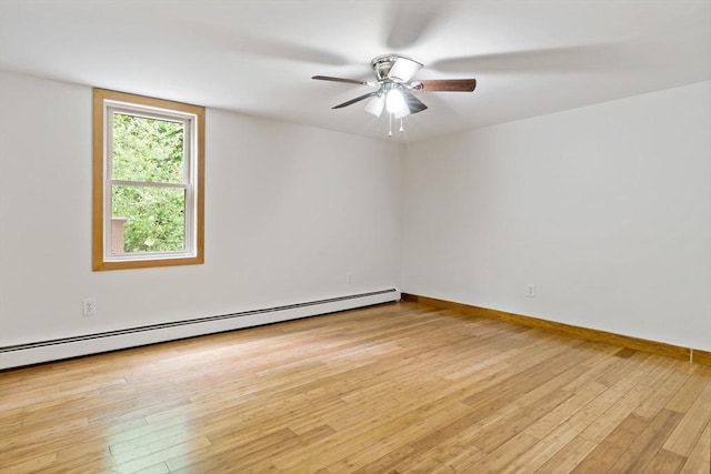 43 Water St, Freetown, MA 02702 - empty room featuring a baseboard heating unit, wood finished floors, ceiling fan, and baseboards