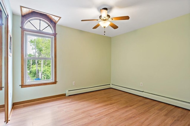 43 Water St, Freetown, MA 02702 - spare room featuring light wood-style floors, baseboard heating, ceiling fan, and baseboards