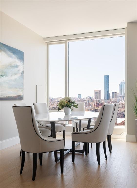 dining area featuring hardwood / wood-style floors