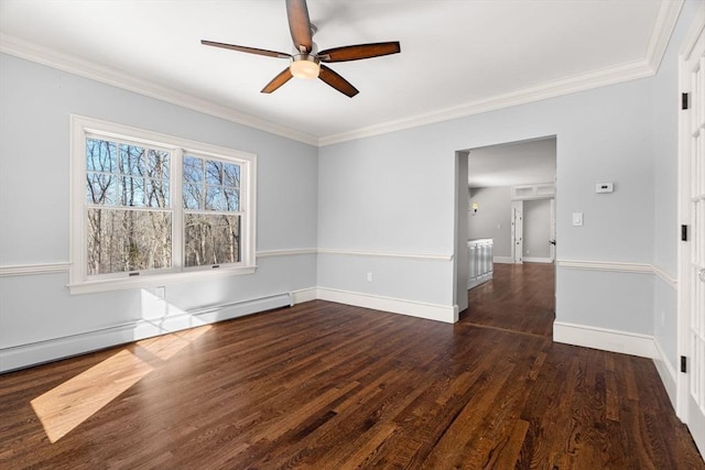 empty room featuring ceiling fan, baseboards, ornamental molding, baseboard heating, and wood finished floors