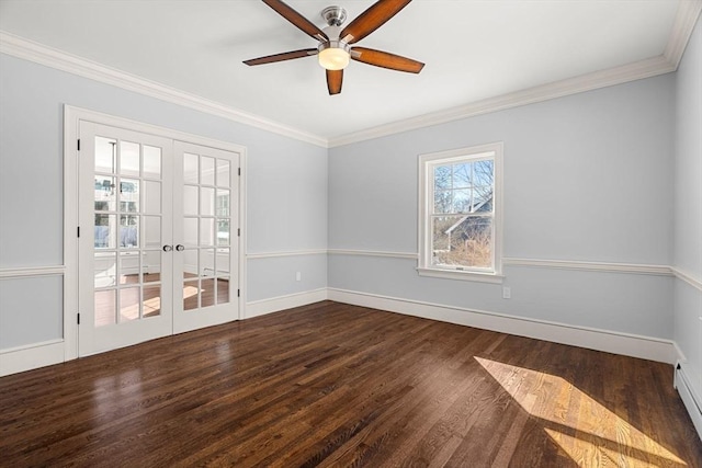 spare room with baseboards, a baseboard radiator, dark wood-type flooring, french doors, and crown molding