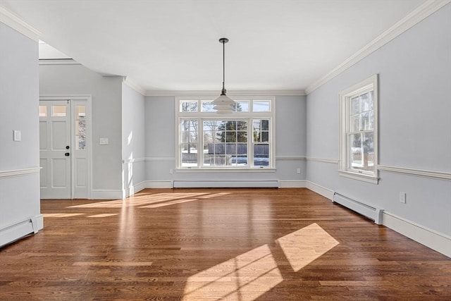 unfurnished dining area featuring ornamental molding, wood finished floors, and a baseboard radiator