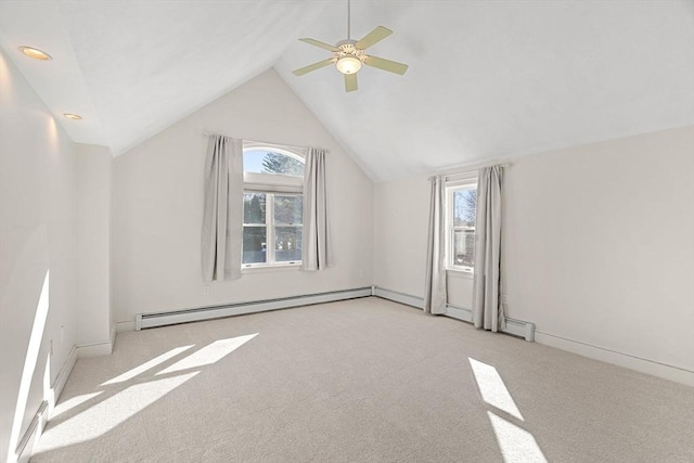 bonus room featuring baseboards, carpet floors, a baseboard radiator, lofted ceiling, and ceiling fan