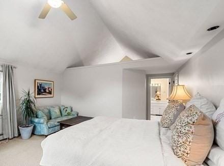 bedroom featuring a ceiling fan, carpet, and vaulted ceiling