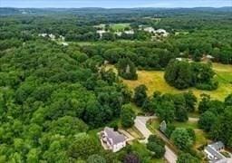 aerial view featuring a forest view