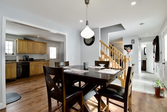 dining room with light hardwood / wood-style flooring