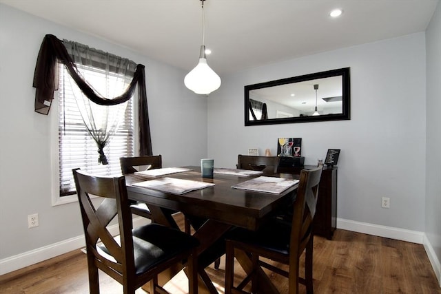 dining area featuring hardwood / wood-style floors