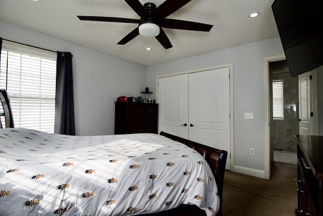 bedroom with carpet, ceiling fan, and a closet