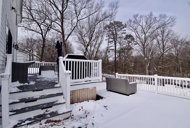 view of snow covered deck