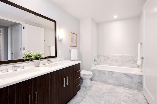 580 Washington St Unit 10F, Boston, MA 02111 - full bath with double vanity, a bath, and marble finish floors