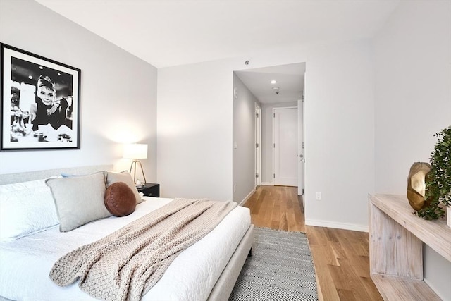 580 Washington St Unit 10F, Boston, MA 02111 - bedroom with light wood finished floors and baseboards