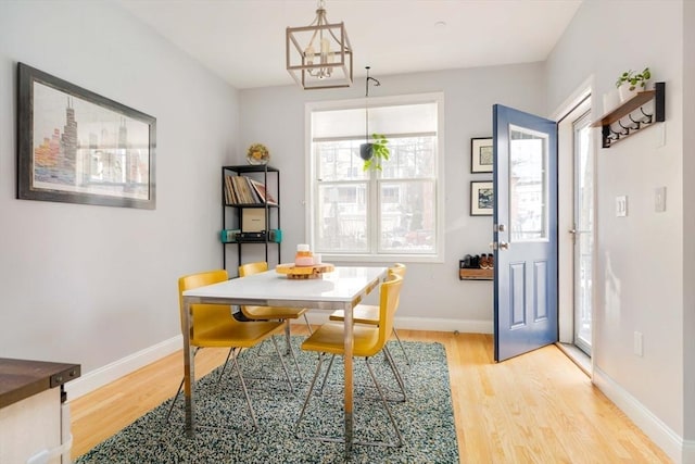 dining area with hardwood / wood-style flooring