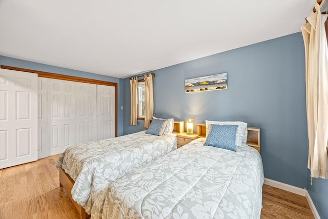 bedroom featuring light wood-type flooring