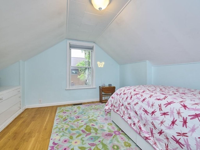 440 Forest St, Waltham, MA 02452 - bedroom with light wood finished floors and lofted ceiling
