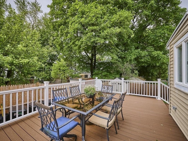 440 Forest St, Waltham, MA 02452 - deck featuring outdoor dining area and view of scattered trees