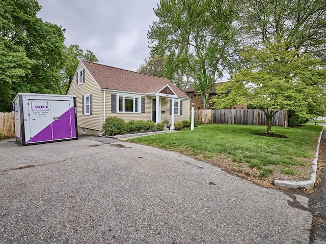440 Forest St, Waltham, MA 02452 - view of front facade featuring a shingled roof
