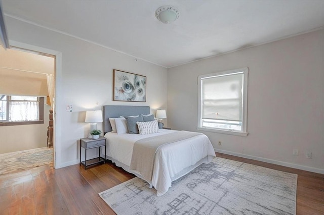 1 Holly St, Attleboro, MA 02703 - bedroom with wood finished floors, baseboards, and crown molding