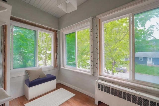 1 Holly St, Attleboro, MA 02703 - sunroom / solarium with radiator, wood finished floors, and baseboards
