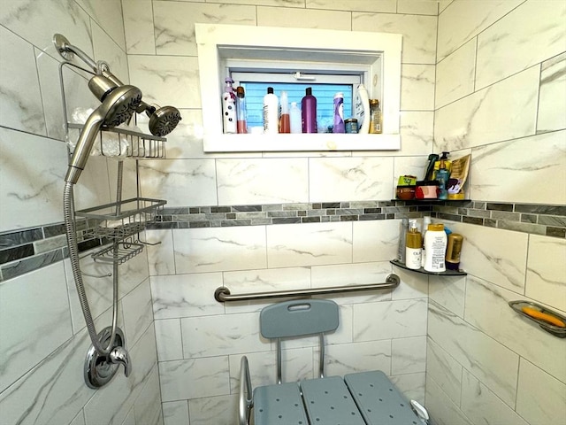 bathroom with a tile shower