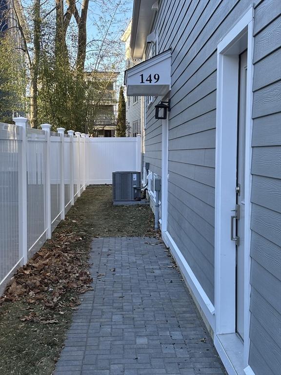 view of property exterior featuring central AC unit