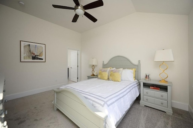 bedroom with ceiling fan, lofted ceiling, and carpet floors