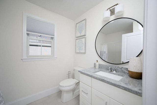 bathroom with tile patterned floors, vanity, toilet, and curtained shower