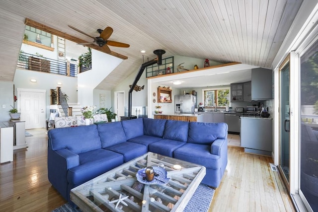 21 Hudson St, New Bedford, MA 02744 - living area with stairs, a ceiling fan, light wood finished floors, wooden ceiling, and high vaulted ceiling