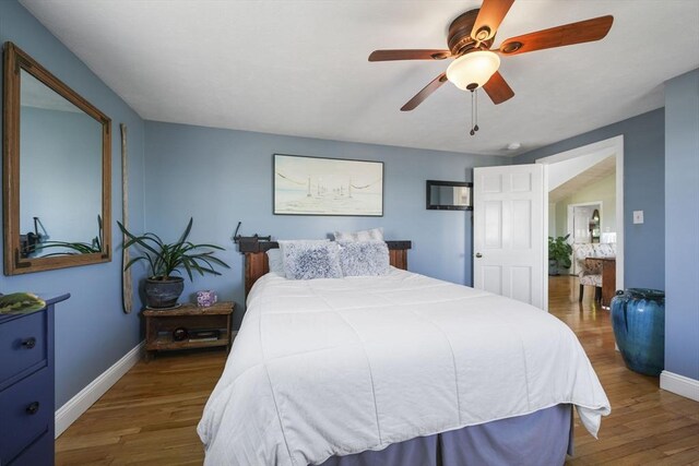 21 Hudson St, New Bedford, MA 02744 - bedroom with wood finished floors, baseboards, and ceiling fan