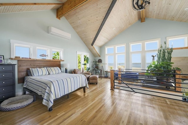 21 Hudson St, New Bedford, MA 02744 - bedroom featuring high vaulted ceiling, beamed ceiling, wood finished floors, and a wall unit AC