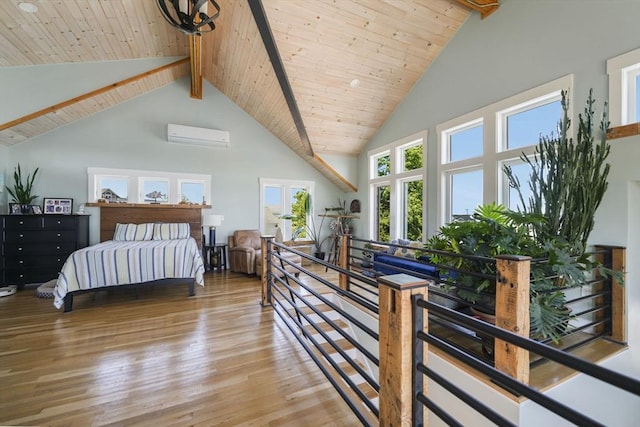 21 Hudson St, New Bedford, MA 02744 - bedroom featuring high vaulted ceiling, wood finished floors, an AC wall unit, and wood ceiling with exposed beams