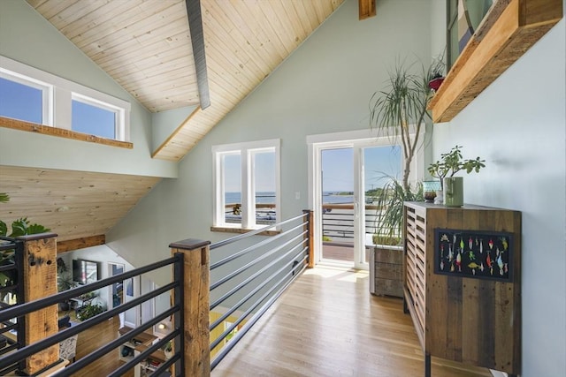 21 Hudson St, New Bedford, MA 02744 - hallway with an upstairs landing, lofted ceiling, wood finished floors, and wooden ceiling